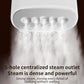 Close-up of white steamer head with multi-hole steam outlet releasing steam