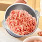 Stainless bowl filled with minced meat after grinding