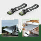 Pair of black awning clips with green latch and nylon straps for RV awning