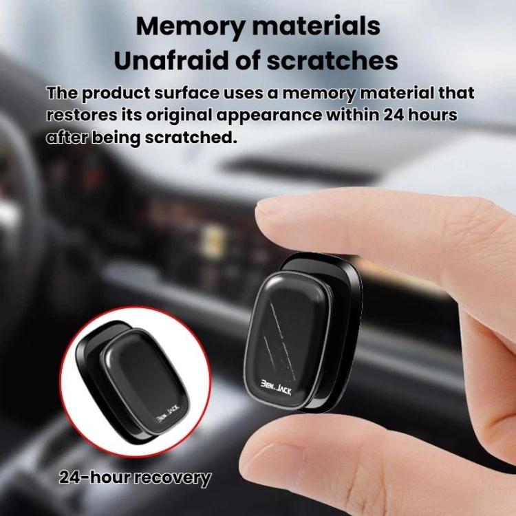 Hand presses a black mini self-adhesive car hook onto a dashboard surface