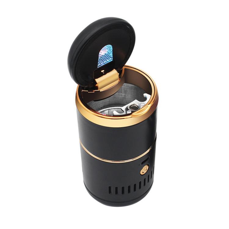 Portable car ashtray vacuum cleaner with lid open, gold accents, black body