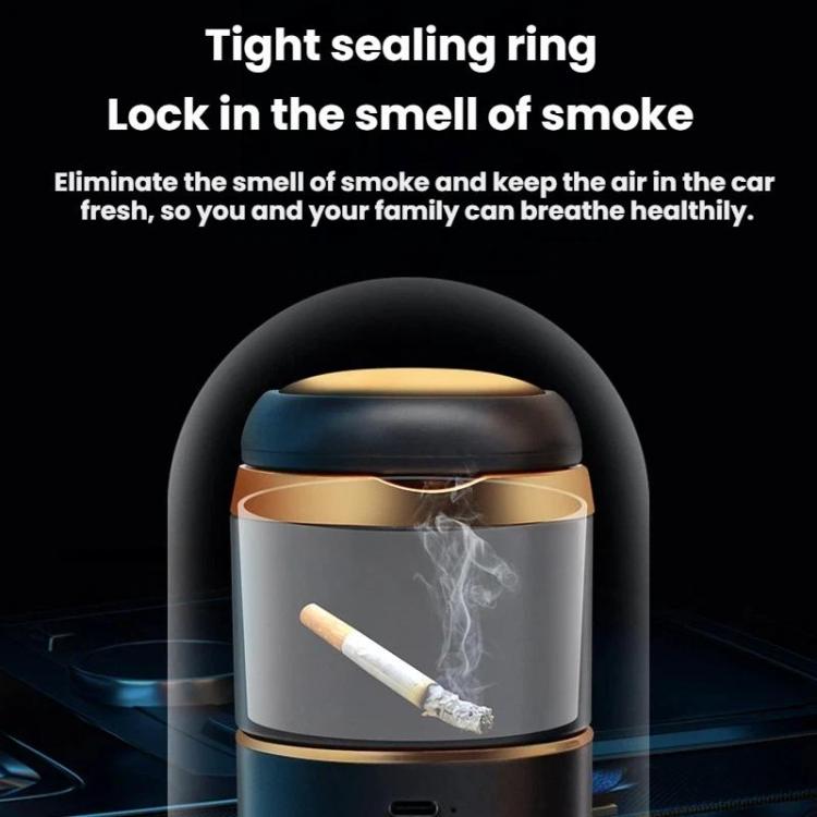 Black portable car ashtray vacuum cleaner with sealed lid and smoke-residue visible