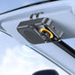 Sun visor-style Bluetooth car speaker with microphone grille and control buttons