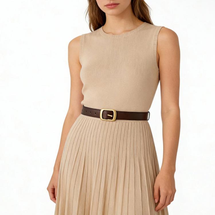 Tan leather jeans belt worn on waist with square gold-tone buckle