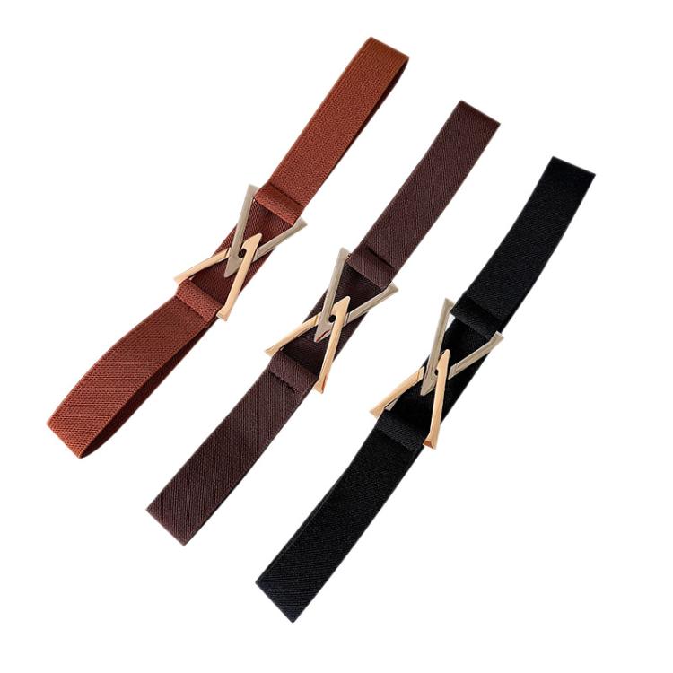 Three woven waist belts with triangle buckles in rust-brown, dark brown, and black