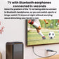 Bluetooth audio adapter near a wall outlet with TV earphones connection setup