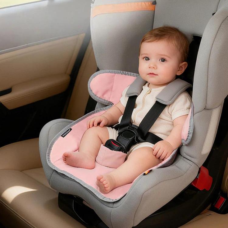 Pink waterproof car seat protector pad on child car seat with baby