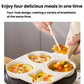 Beige four-hole nonstick frying pan with four cooked egg sections