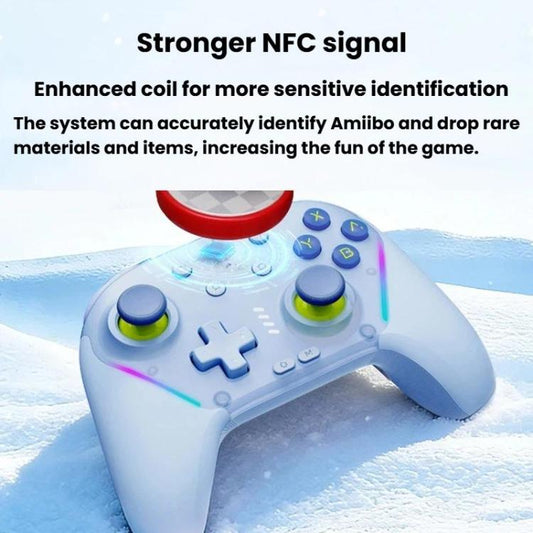 Light blue wireless controller on snow with colorful face buttons and green thumbsticks