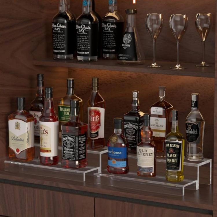Clear acrylic 2-tier liquor display rack with multiple bottles