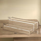 Clear acrylic 2-tier rack with labeled size dimensions