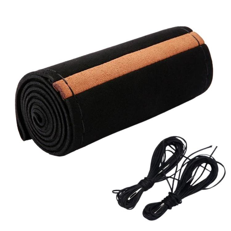 Suede steering wheel cover, black with tan center stripe, rolled with black lacing cords