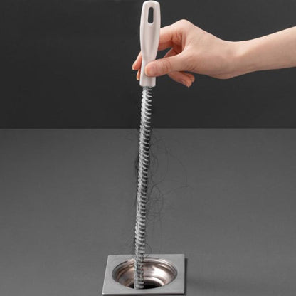 Drain pipe cleaning brush with white handle and coiled metal bristles