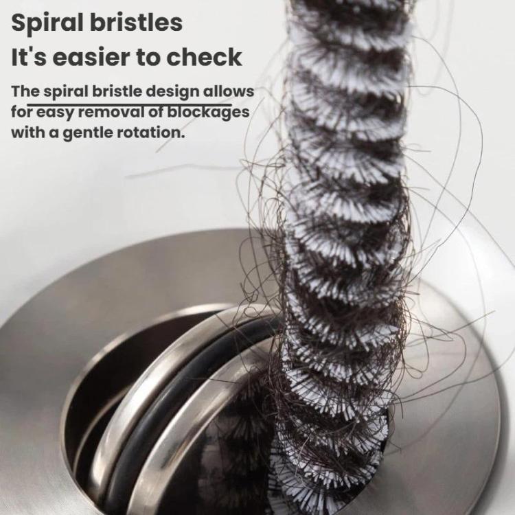 Spiral bristles drain cleaning rod with hair and debris on the coil