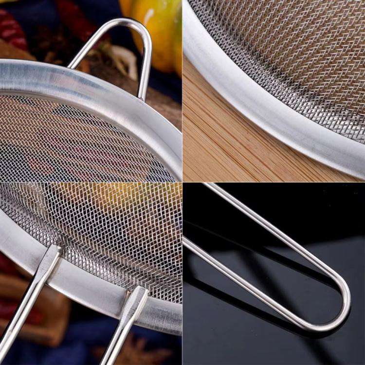 Close-up of stainless steel fine mesh oil strainer with metal frame and handles