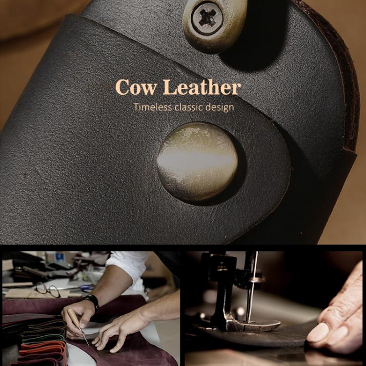 Close-up leather key pouch with metal keyring and round snap button closure