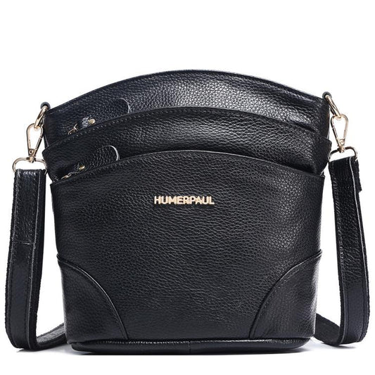 Black leather shoulder crossbody bag with flap and adjustable shoulder strap