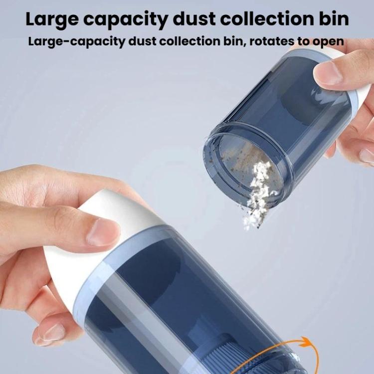 Handheld vacuum dust collection bin rotating open with blue transparent chamber