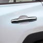 Door handle protective cover with black insert on a car door handle