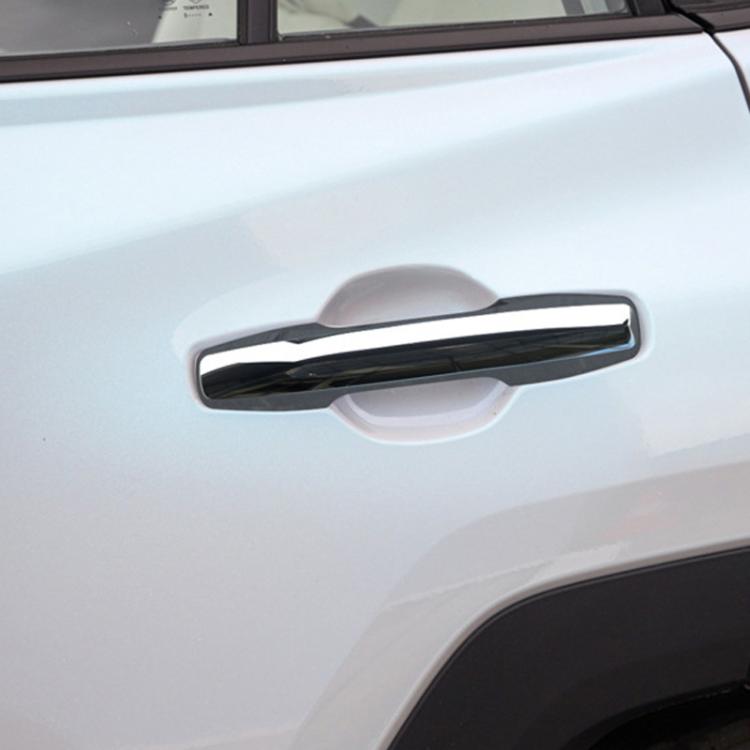 Door handle protective cover with black insert on a car door handle