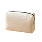 Beige lace cosmetic bag with top zipper and gold-tone pull tab