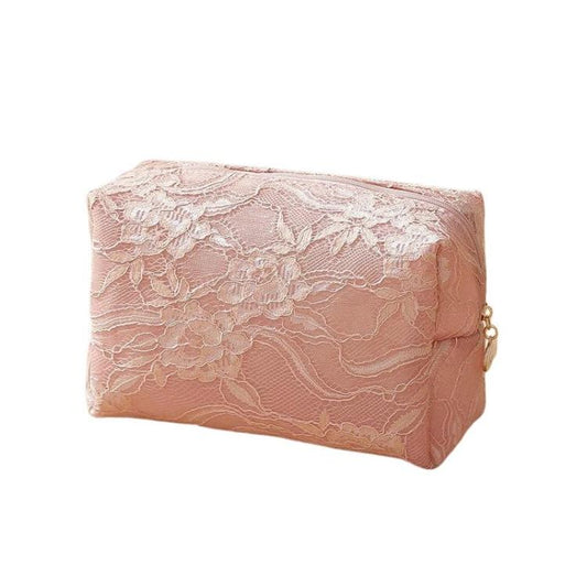 Pink lace cosmetic bag with top zipper and gold-tone pull tab