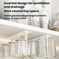 White under-cabinet cup holder rack holding inverted clear cups beside bottles