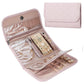 Pink faux-suede jewelry storage roll bag with snap flap, open slots for earrings
