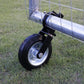Gate wheel caster mounted on round metal pipe frame with black steel bracket