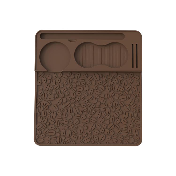 Coffee-brown silicone espresso tamper mat with leaf-pattern texture and molded holder