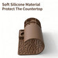 Coffee-brown silicone tamper mat with leaf texture and raised side tray
