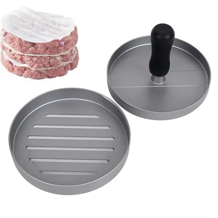 Hamburger patty mold press with two gray plates and black handle, plus stacked patties