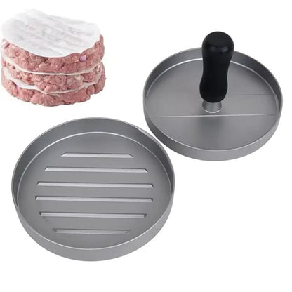 Hamburger patty mold press with two gray plates and black handle, plus stacked patties