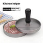 Hamburger patty mold press with gray base, black handle, and minced meat patty