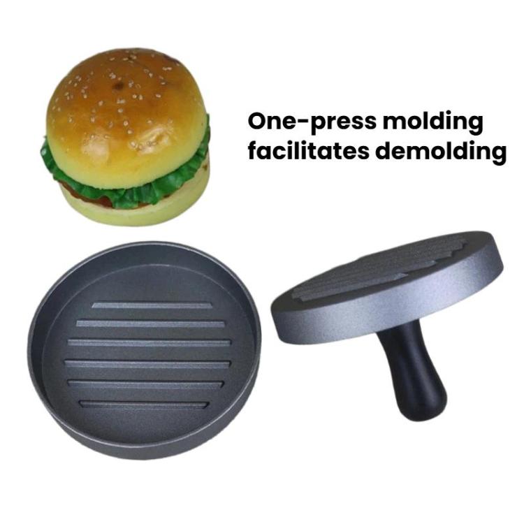 Hamburger patty mold press with gray ridged plate and black handle tool