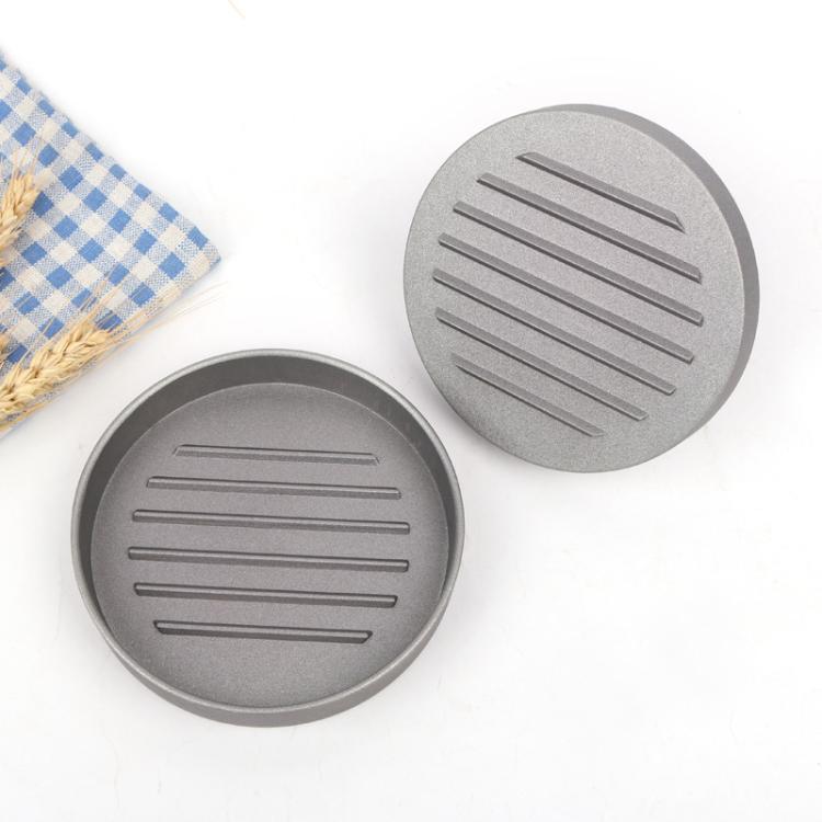 Hamburger patty mold plates set with two gray ridged surfaces