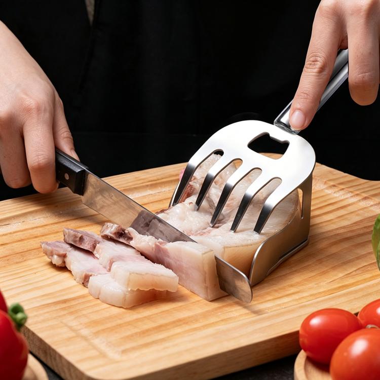 All-steel bear claw meat shredder with hand guard, claw tines over sliced meat