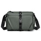 Men's green sling bag with magnetic front buckle and adjustable shoulder strap