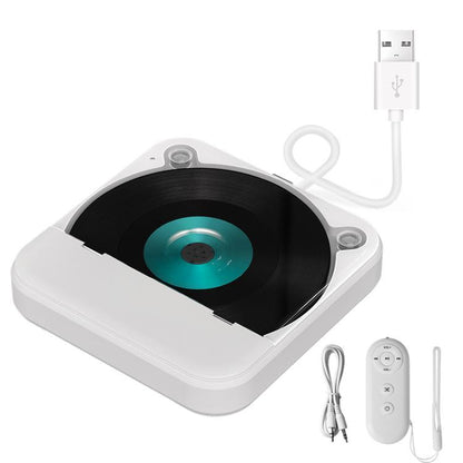 White car external CD player with lid open and compact disc loaded