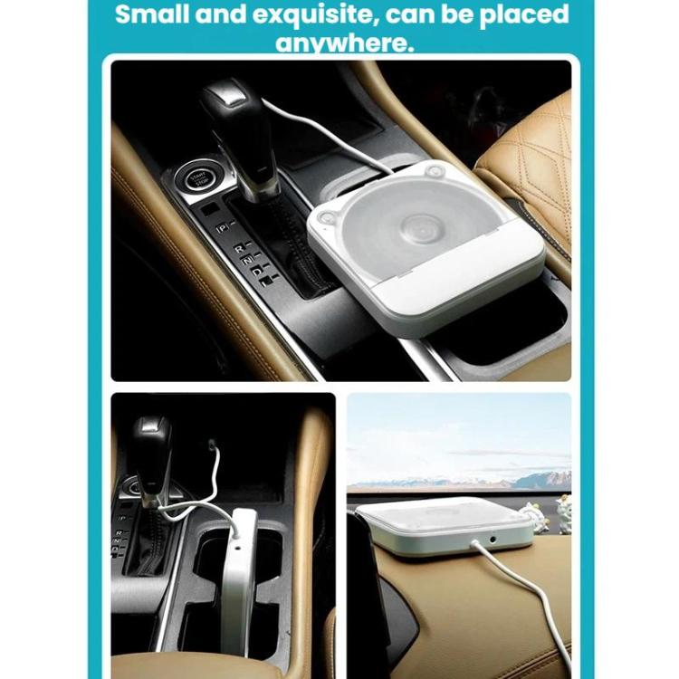 White external CD player placed in car center console with USB cable