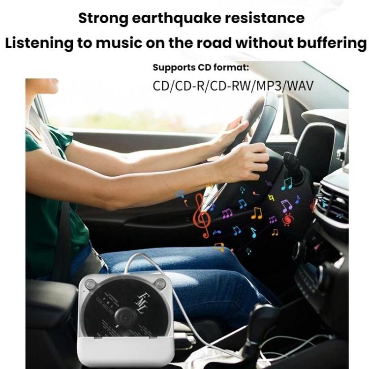 White external CD player mounted in car with cables attached