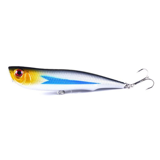 White, blue, and yellow surface fishing lure with treble hooks and split rings.