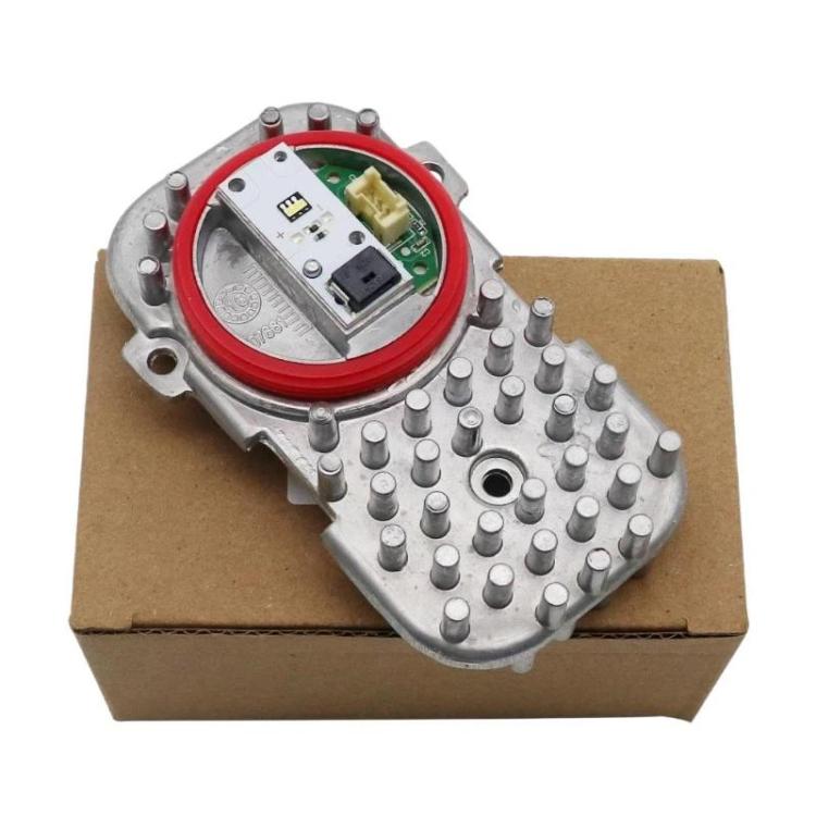 3-pin LED headlight module in retail box, showing red bezel and circuit board