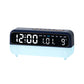Deep blue digital alarm clock with large LED time display and night light base
