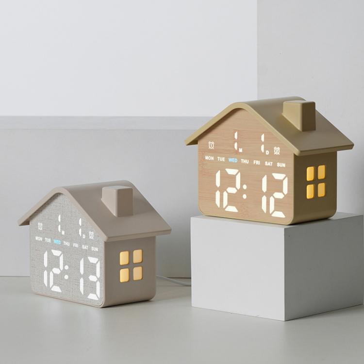 House-shaped digital alarm clocks in yellow and gray, each with illuminated time display