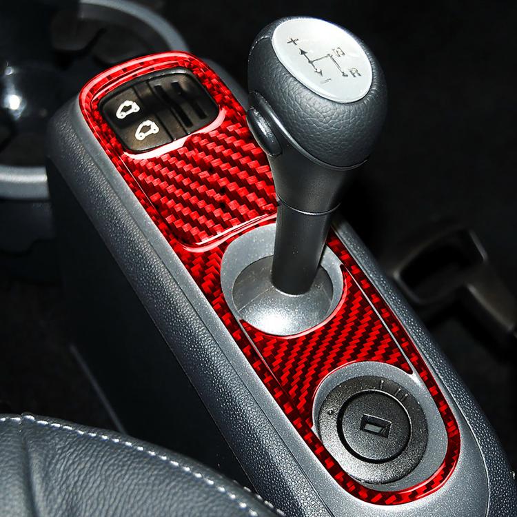Red carbon-fiber Type C gearshift trim stickers with three panels around shifter