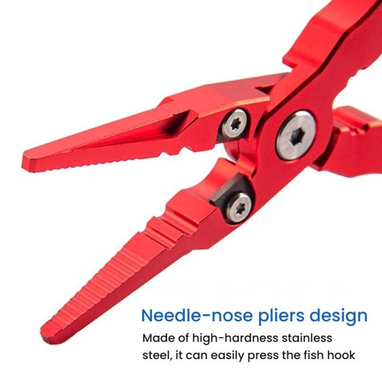 Red needle-nose fishing pliers close-up of metal jaws and pivot