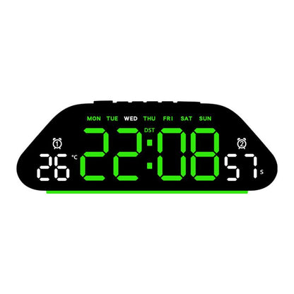 Black digital alarm clock with green LED time and day indicators