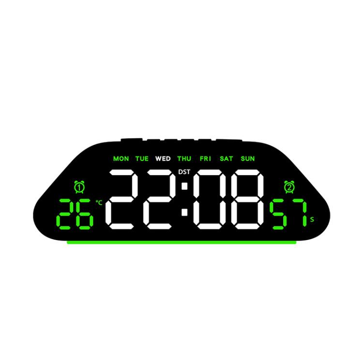 Black digital alarm clock with green LED time display and 7-day labels