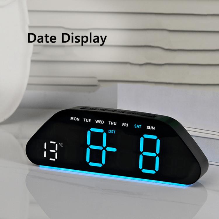 Black digital alarm clock with blue LED date display and temperature on screen